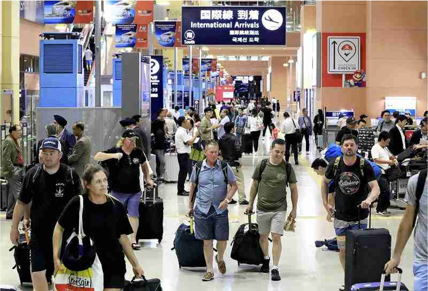 Yomiuri Shimbun file photo Foreign tourists are seen at Kansai Airport in October 2018.
